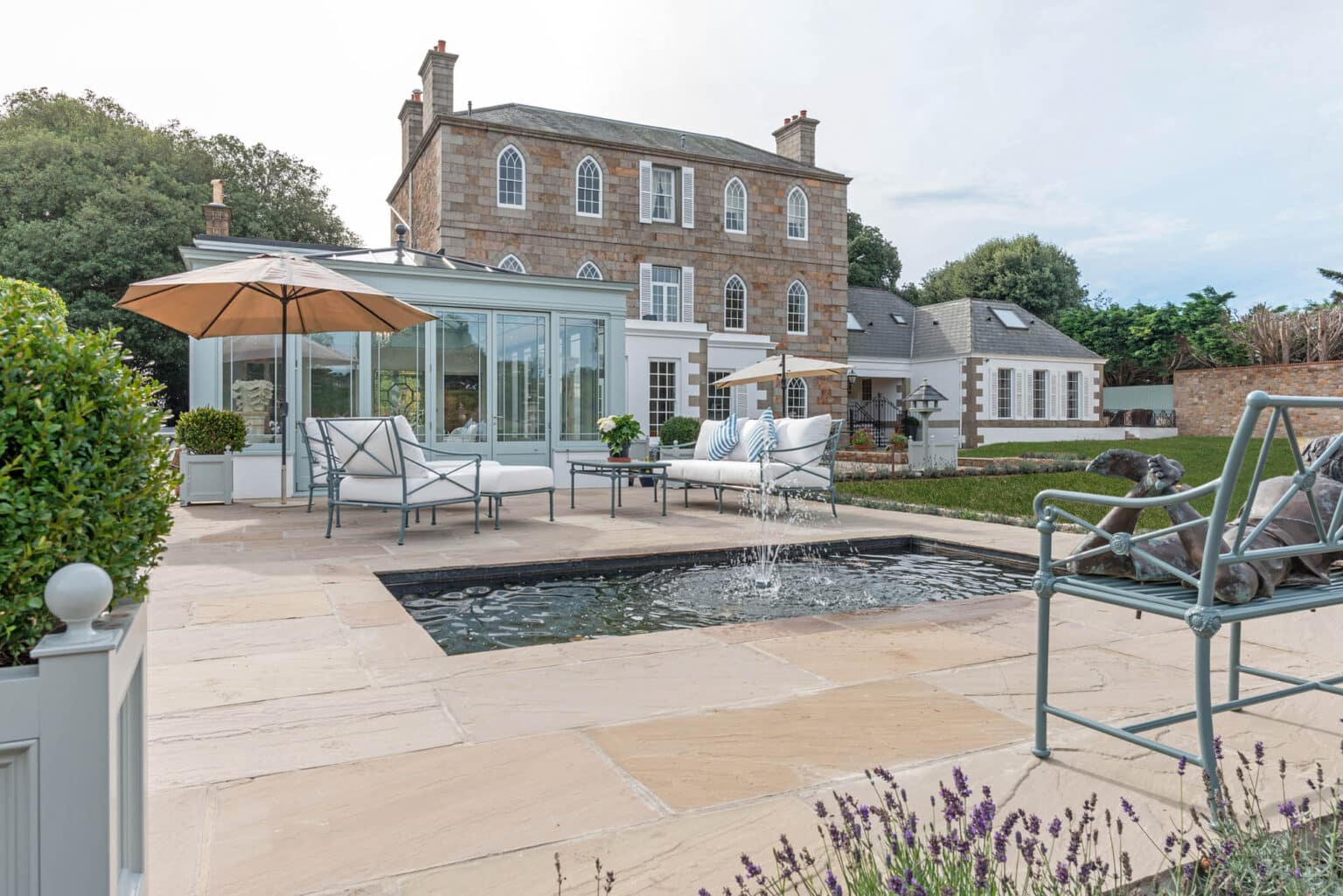 Hotel swimming pool with a bespoke hardwood pool house.