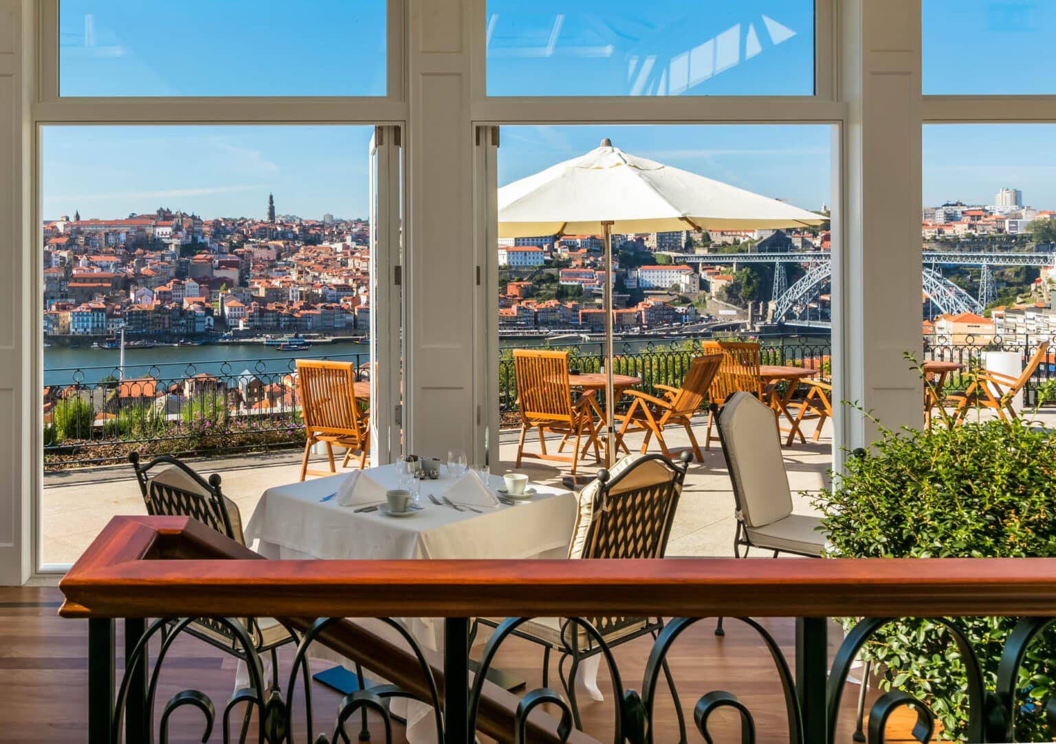 Commercial bar or restaurant with stunning views from a glazed extension.