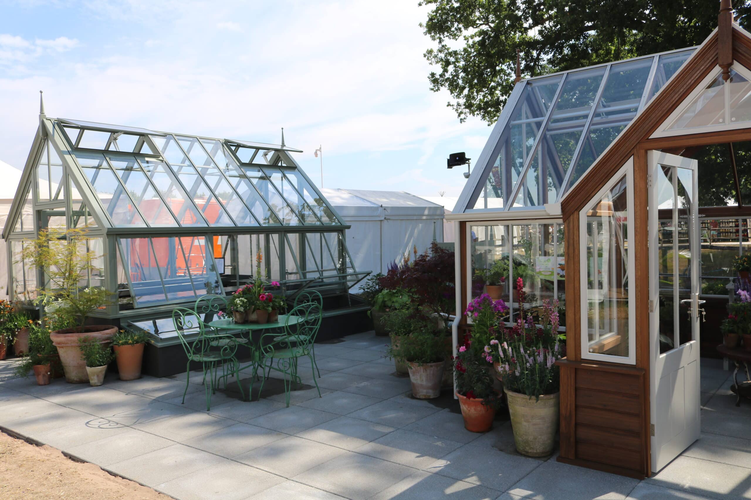 Two Hampton greenhouse display models at RHS Hampton Court.